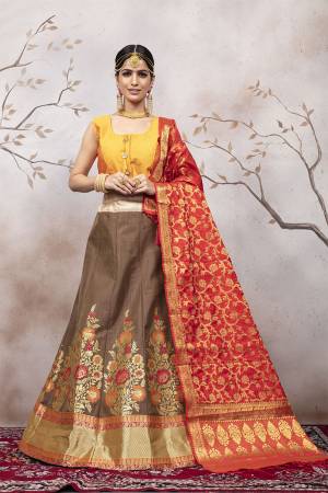 Go Colorful with Thid Very Designer Lehenga Choli In Musturd Yellow Colored Blouse Paired With Brown Colored Lehenga And Red Colored Dupatta. This Lehenga Choli And Dupatta Are Silk Based Beautified With Weave. Buy Now.