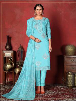 Here Is A Pretty Dress Material In Sky Blue Color With Attractive Gota patti Work, Get This Stitched As Per Your Desired Fit And Comfort. Its Top Is Fabricated On Modal Cotton Paired With Santoon Bottom And Art Silk Dupatta. 
