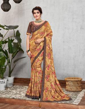 Creating a perfect symphony of earthy colors, flowers and sequins , this floral printed saree is a sweet summery melody. Pair with delicate jewels to balance the look. 