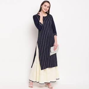Look Pretty In This Readymade Pair Of Kurti With Bottom In Navy Blue Color Paired With Off-White Colored Bottom. This Kurti Is Rayon Based Paired With Cotton Fabricated Bottom. Buy This Lovely Pair Now.