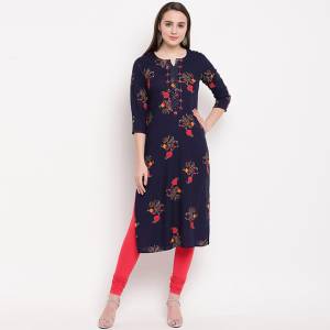For Your Semi-Casuals, Outing Or Work Place, This Readymade Kurti Is Suitable For All. This Rayon Based Kurti Is In Navy Blue Color Beautified With Prints And Hand Work. Buy Now.