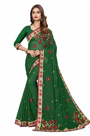 Add This Pretty Designer Saree To Your Wardrobe In Green Color. This Saree Is Fabricated On Georgette  Paired With Georgette Fabricated Blouse. It Is Beautified With Heavy Attractive Embroidery. 
