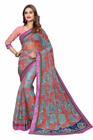 Get Ready For The Upcoming Festive Season With This Designer Saree In Multi Color. This Pretty Embroidered Saree Is Net Based Paired With Art Silk Fabricated Blouse. It Is Light Weight And Easy To Drape.