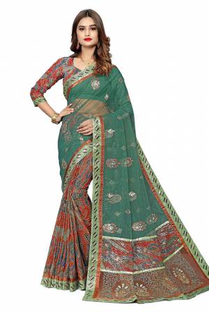 Here Is An Attractive Looking Designer Saree In Sea Green And Multi Color. This Saree Is Fabricated On Jacquard Silk And Net Paired With Jacquard Silk Fabricated Blouse. Buy This Saree Now.
