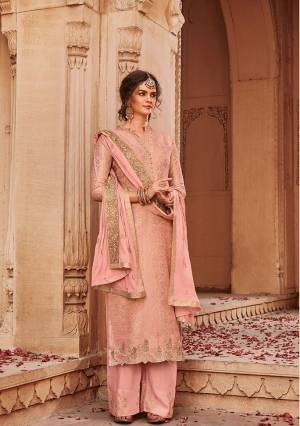 Look Pretty In This Heavy designer Straight Suit In Pretty Dusty Pink Color. Its Top Is Fabricated On Jacquard Silk Paired With Santoon Bottom And Chinon Fabricated Heavy Embroidered Dupatta. Its Pretty Color And Embroidery Will Definitely Earn You Lots Of Compliments From Onlookers. 
