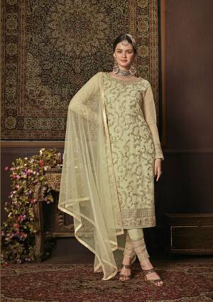 This Season Is About Subtle Shades And Pastel Play, So Grab This Heavy Designer Straight Suit In Pastel Green Color. Its Top Is Net Based Paired With Soft Silk Bottom And Net Fabricated Dupatta. It Top Is Beautified With Attractive All Over Embroidery. 