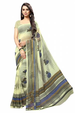 Beat The Heat This Summer Wearing This Pretty Light Weight Saree In Light Green Color. This Saree And Blouse Are Fabricated On Chiffon Which Is Easy To Carry All Day Long.