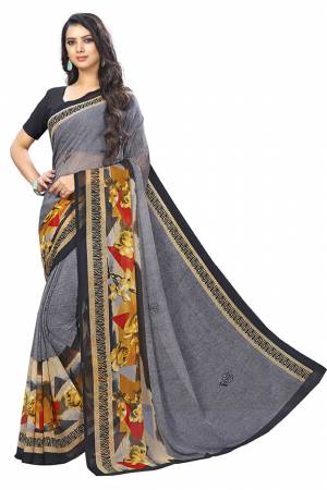 Beat The Heat This Summer Wearing This Pretty Light Weight Saree In Grey Color. This Saree And Blouse Are Fabricated On Chiffon Which Is Easy To Carry All Day Long.