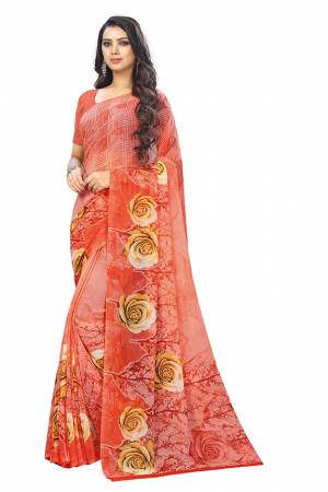 Beat The Heat This Summer Wearing This Pretty Light Weight Saree In Orange Color. This Saree And Blouse Are Fabricated On Chiffon Which Is Easy To Carry All Day Long.