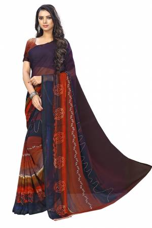 Simple And Elegant Looking Saree Is Here For Your Casual Or Semi-Casual Wear In Multi Color. This Pretty Saree And Blouse Are Chiffon Based Beautified With Prints All Over. 