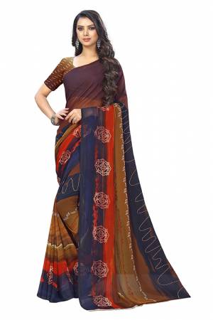 Beat The Heat This Summer Wearing This Pretty Light Weight Saree In Multi Color. This Saree And Blouse Are Fabricated On Chiffon Which Is Easy To Carry All Day Long.