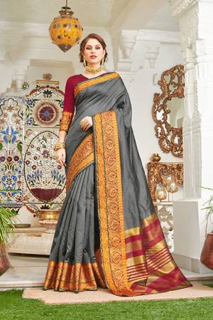 For A Royal Look, Grab This Designer Silk Based Saree In Dark Grey Color. This Saree And Blouse Are Fabricated On Handloom Silk Beautified With Weaved Lace Border. Buy This Pretty Elegant Saree Now.