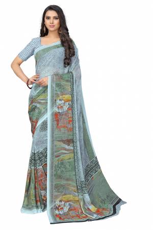 Beat The Heat This Summer Wearing This Pretty Light Weight Saree?In Light Blue Color. This Saree And Blouse Are Fabricated On Chiffon Which Is Easy To Carry All Day Long.