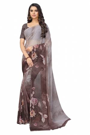 Add Some Casuals With This Pretty Printed Saree In Mauve Color. This Saree And Blouse Are Fabricated Chiffon Beautified With Prints. It Is Light In Weight And Easy To Carry All Day Long.