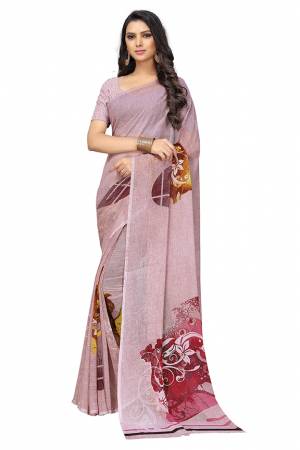 Simple And Elegant Looking Saree Is Here For Your Casual Or Semi-Casual Wear In Baby Pink Color. This Pretty Saree And Blouse Are Chiffon Based Beautified With Prints All Over.