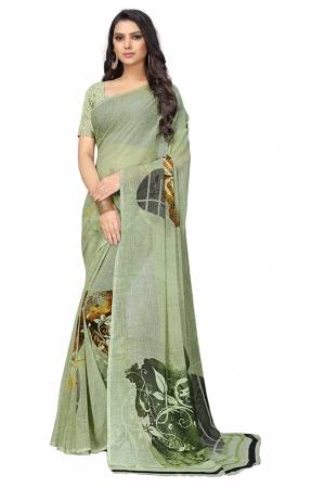 Add Some Casuals With This Pretty Printed Saree In Light Green Color. This Saree And Blouse Are Fabricated Chiffon Beautified With Prints. It Is Light In Weight And Easy To Carry All Day Long.