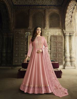 Look Pretty This Designer Floor Length Suit In Lovely Pink Color. Its Pretty Embroidred Top Is Soft Silk Based Paired With Cotton Satin Bottom And Net Fabricated Embroidered Dupatta Which Gives An Attractive To The Suit. 