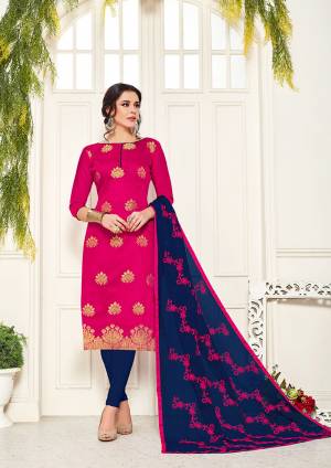 Add This Designer Straight Suit To Your Wardrobe In Dark Pink Colored Top Paired With Contrasting Navy Blue Colored Bottom And Dupatta, Its Top Is Fabricated On Banarasi Silk Paired With Cotton Bottom And Chiffon Fabricated Dupatta. Buy This Dress Material Now.