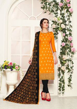 Add This Designer Straight Suit To Your Wardrobe In Orange Colored Top Paired With Black Colored Bottom And Dupatta, Its Top Is Fabricated On Banarasi Silk Paired With Cotton Bottom And Chiffon Fabricated Dupatta. Buy This Dress Material Now.