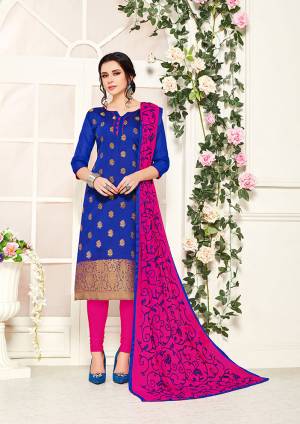 Add This Designer Straight Suit To Your Wardrobe In Royal Blue Colored Top Paired With Contrasting Rani Pink Colored Bottom And Dupatta, Its Top Is Fabricated On Banarasi Silk Paired With Cotton Bottom And Chiffon Fabricated Dupatta. Buy This Dress Material Now.