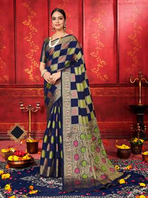 Enhance Your Personality Wearing This Designer Silk Based Saree In Navy Blue Color Paired With Navy Blue Colored Blouse. This Saree and Blouse Are Fabricated On Banarasi Silk Beautified With Weave With Attractive Checks Pattern. Buy Now.