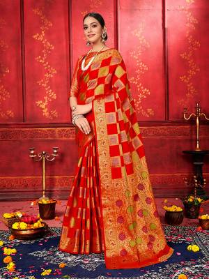 Here Is Bold And Beautiful Looking Saree For The Upcoming Festive Season In Red Color. This Saree And Blouse Are Fabricated On Banarasi Silk Beautified With Checks Pattern And Weave.