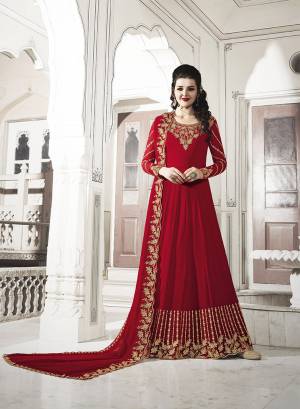 For The Upcoming Wedding And Festive Season, Grab This Heavy Designer Floor Length Suit In Red Color. Its Heavy Embroidered Top and Dupatta Are Fabricated On Georgette Paired With Soft Silk Bottom. Buy Now.