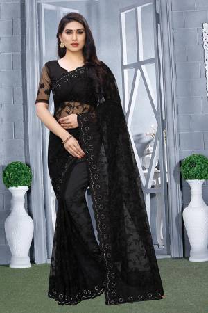 For A Bold And Beautiful Look, Grab This Heavy Designer Tone To Tone Embroidered Saree In Black Color. This Saree And Blouse Are Fabricated Net. Also It Comes With A Pretty Same Colored Satin Inner. 