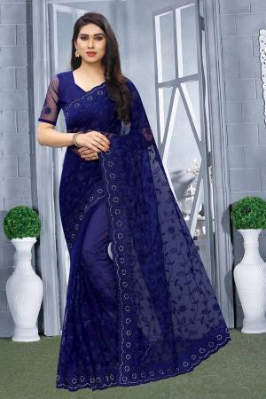 For A Bold And Beautiful Look, Grab This Heavy Designer Tone To Tone Embroidered Saree In Royal Blue Color. This Saree And Blouse Are Fabricated Net. Also It Comes With A Pretty Same Colored Satin Inner. 