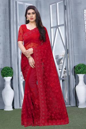 For A Bold And Beautiful Look, Grab This Heavy Designer Tone To Tone Embroidered Saree In Red Color. This Saree And Blouse Are Fabricated Net. Also It Comes With A Pretty Same Colored Satin Inner. 