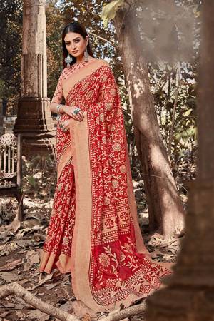 Add This Beautiful Cotton Based Designer Saree To Your Wardrobe In Red Color. This Saree Is Fabricated On Cotton Brasso Paired With Art Silk Fabricated Blouse,  It Is Light Weight, Durable And Easy To Care For. 