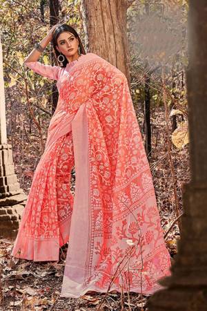 Celebrate This Festive Season With Beauty And Comfort Wearing This Pretty Saree In Dark Peach Color. This Saree Is Cotton Brasso Based Paired With Art Silk Fabricated Blouse. It Is Light In Weight And Easy To Carry All Day Long. 