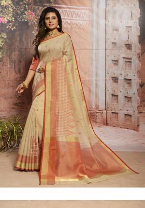 Look Pretty In This Lovely Cream And Orange Colored Designer Saree. This Saree And Blouse Are Cotton Based Beautified With Elegant Thread Work. Buy This Saree Now. 