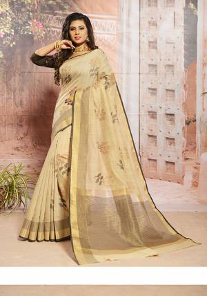 Flaunt Your Rich And Elegant Taste Wearing This Pretty Simple Saree In Cream And Black Color. This Saree Pretty Saree Is Cotton Based Beautified With Thread Work. It Is Light In Weight And Easy To Carry All Day Long. Buy Now.. 