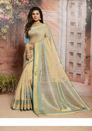 Celebrate This Festive Season With Beauty And Comfort Wearing This Saree In Cream And Sky Blue Color. This Saree And Blouse Are Cotton Based Beautified With Thread Work. It Is Light In Weight And Easy To Carry All Day Long. 