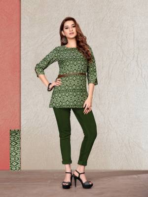 For Your Semi-Casual Wear, Grab This Printed Readymade Short Kurti In Green Fabricated On Cotton. It Is Light In Weight And Easy To Carry All Day Long. 