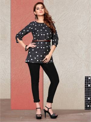 Here Is A Readymade Printed Short Kurti In Black Color Fabricated On Cotton. It Is Beautified With Prints And Available In All Regular Sizes. You Can Pair This Up With Pants Or Denim. Buy Now. 