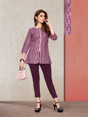 For Your Semi-Casual Wear, Grab This Printed Readymade Short Kurti In Purple Fabricated On Cotton. It Is Light In Weight And Easy To Carry All Day Long. 