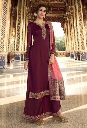 Grab This Beautiful Designer Suit In Maroon Color Paired With Pink Colored Dupatta. Its Pretty Top Is Fabricated On Satin Georgette Paired With Santoon Bottom And Chinon Fabricated Dupatta. Its Pretty Top Is Beautified With Attractive Elegant Embroidery Which Will Earn You Lots Of Compliments From Onlookers.