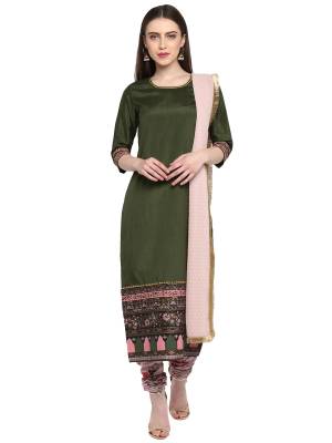 You Will Definitely Earn Lots Of Compliments Wearing This Designer Readymade Straight Suit In Olive Green Colored Top Paired With Contrasting Baby Pink Colored Bottom And Dupatta. This Suit Is Polyester Based Paired With Georgette Fabricated Dupatta. 
