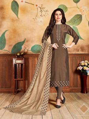 Flaunt Your Rich And Elegant Taste Wearing This Designer Suit In Brown Color Paired With Beige Colored Dupatta. This Dress Material Is Pandora Silk Based Paired With Santoon Bottom And Cotton Silk Dupatta, Buy This Pretty Dress Material Now.