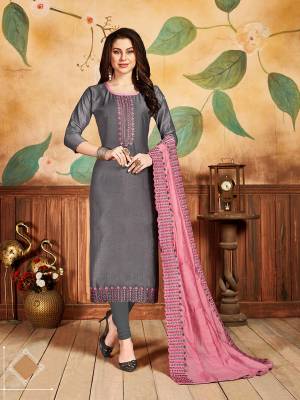 Flaunt Your Rich And Elegant Taste Wearing This Designer Suit In Grey Color Paired With Pink Colored Dupatta. This Dress Material Is Pandora Silk Based Paired With Santoon Bottom And Cotton Silk Dupatta, Buy This Pretty Dress Material Now.