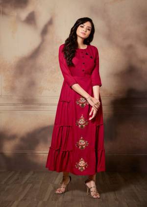 Look Pretty In Wearing This Lovely Long Designer Readymade Kurti In Dark Pink Color. It Is Fabricated On Handloom Rayon Beautified With Thread Embroidery And Pattern .