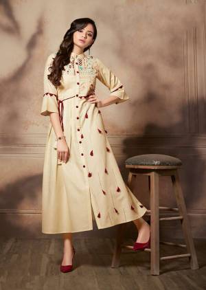 Flaunt Your Rich And Elegant Taste Wearing This Designer Readymade Long Kurti In Cream Color. It Is Fabricated On Handloom Rayon Beautified With Thread Embroidery. Buy Now.