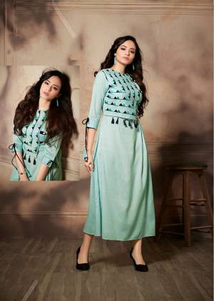 Grab This Pretty Readymade Designer Long Kurti In Sea Green Color. It Is Fabricated On Handloom Rayon Beautified With Thread Embroidery. 