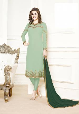 Get Ready For The Upcoming Festive And Wedding Season Wearing This Designer Straight Suit In Pastel Green Color Paired With Dark Green Colored Dupatta. Its Top Is Georgette Based Paired With Santoon Bottom And Chiffon Fabricated Dupatta. Buy Now.