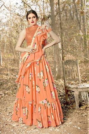 You Will Definitely Earn Lots Of Compliments Wearing This Designer Readymade Lehenga Choli In Orange Color. This Lovely Lehenga Choli And Dupatta Are Georgette Based Which IS Light Weight And Easy To Carry Throughout The Gala. 