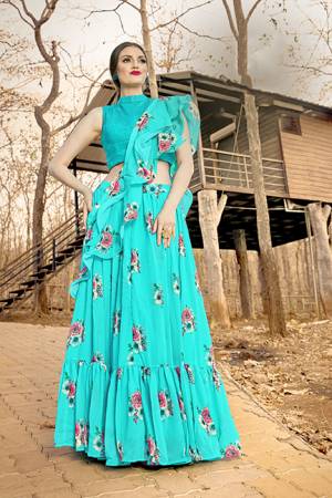 You Will Definitely Earn Lots Of Compliments Wearing This Designer Readymade Lehenga Choli In Sky Blue Color. This Lovely Lehenga Choli And Dupatta Are Georgette Based Which IS Light Weight And Easy To Carry Throughout The Gala. 
