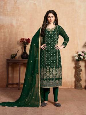 Grab This Simple And Elegant Yet Heavy Designer Straight Suit In Dark Green Color. Its Heavy Embroidered Top Is Fabricated On Georgette Paired With Santoon Bottom And Georgette Fabricated Dupatta. All Its Fabrics Ensures Superb Comfort All Day Long. Buy Now.