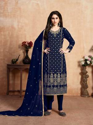 Grab This Simple And Elegant Yet Heavy Designer Straight Suit In Navy Blue Color. Its Heavy Embroidered Top Is Fabricated On Georgette Paired With Santoon Bottom And Georgette Fabricated Dupatta. All Its Fabrics Ensures Superb Comfort All Day Long. Buy Now.